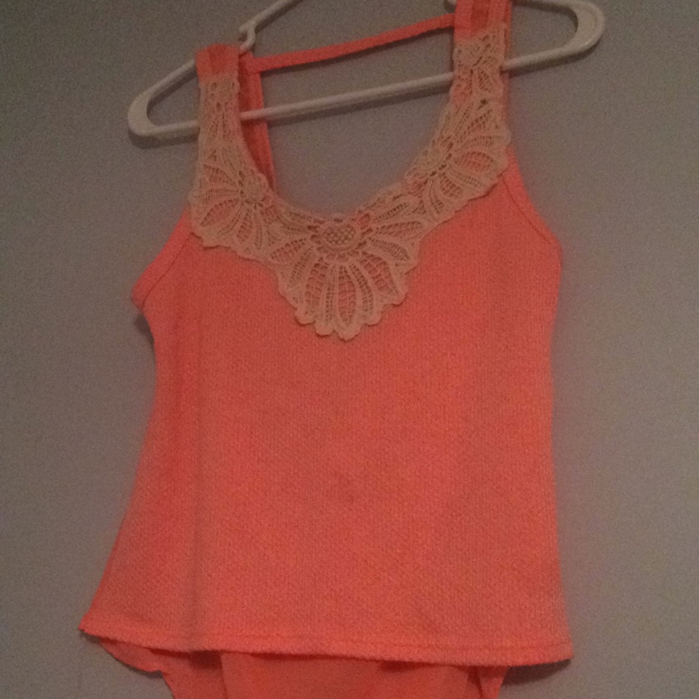 A bright pink tank top